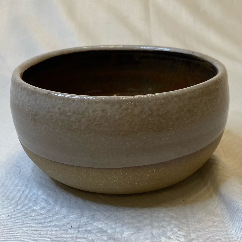 Stoneware glazed bowl marked on bottom.